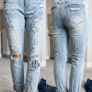 Paint splattered ripped stretchy jeans